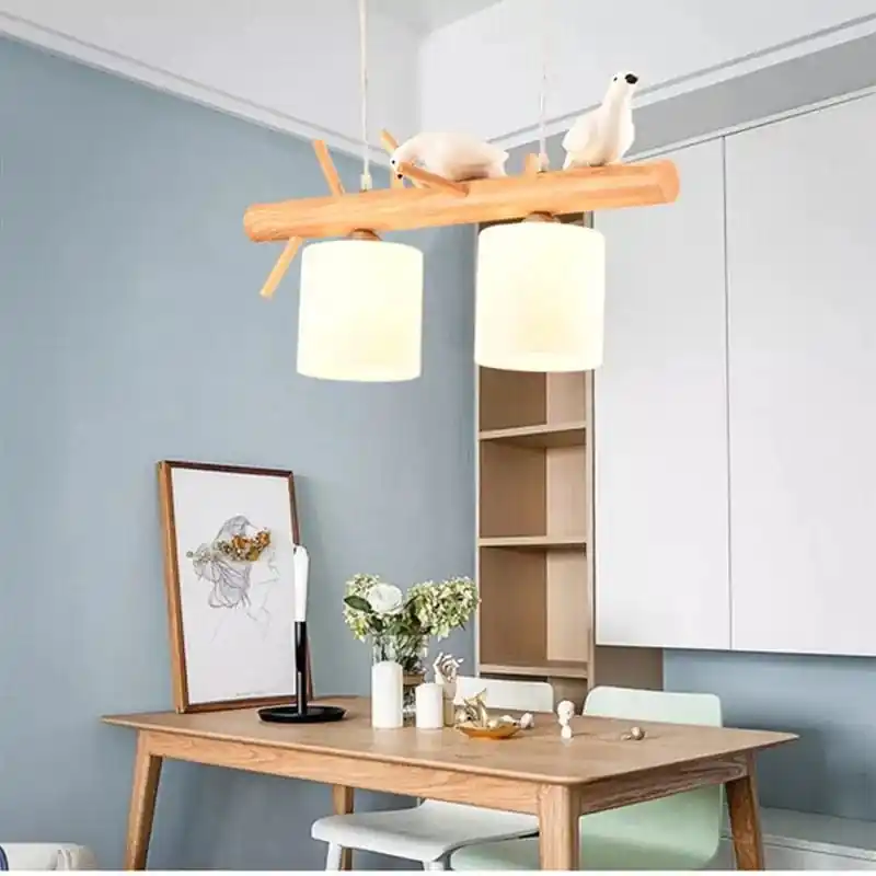 Lustre nordique en bois massif avec motifs d'oiseaux nordiques