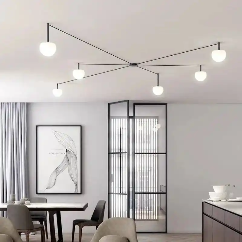 Plafonnier LED suspendu de style nordique moderne et minimaliste.