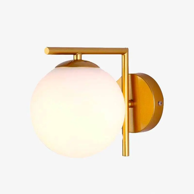Design : Applique luminaire avec branche dorée et boule en verre