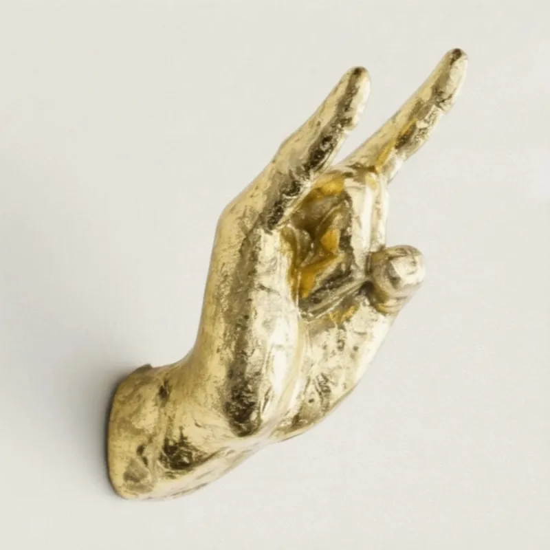 Arden Rock Hand Gesture Resin Wall Decor